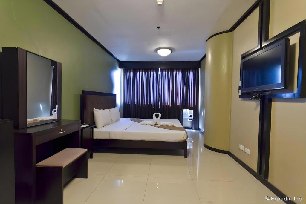 Richmond Plaza Hotel Tabok Екстериор снимка