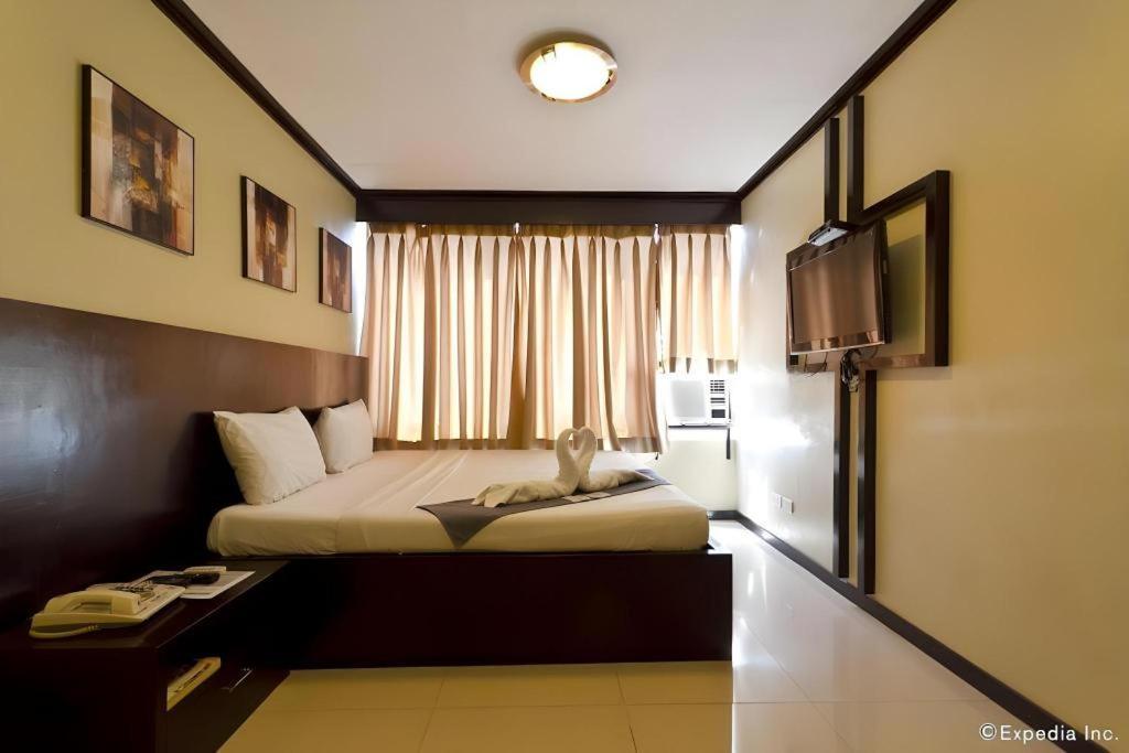 Richmond Plaza Hotel Tabok Екстериор снимка
