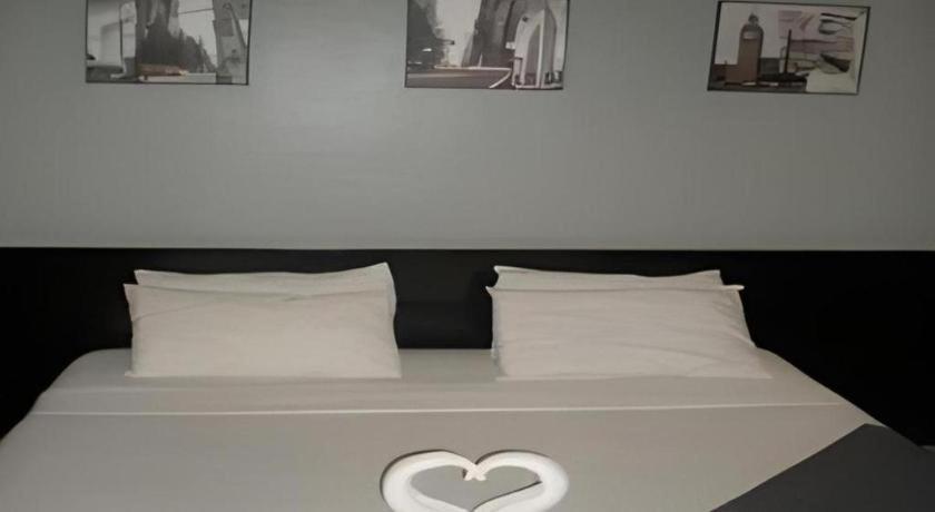Richmond Plaza Hotel Tabok Екстериор снимка