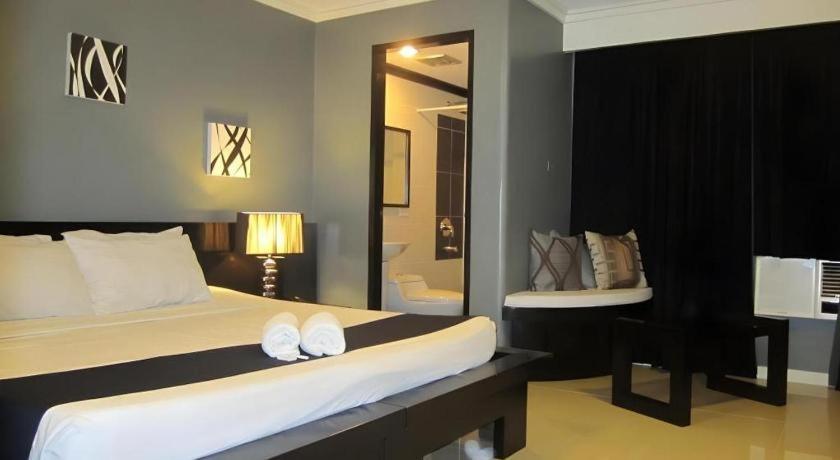 Richmond Plaza Hotel Tabok Екстериор снимка