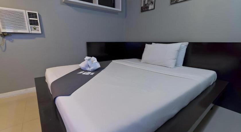 Richmond Plaza Hotel Tabok Екстериор снимка
