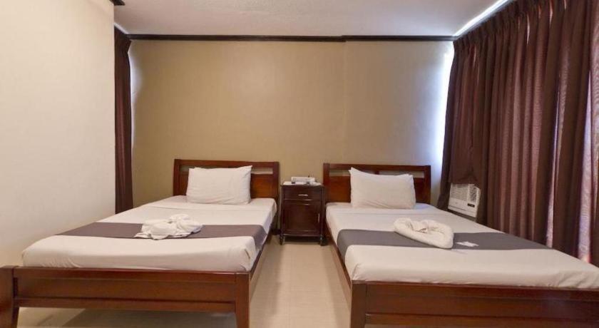 Richmond Plaza Hotel Tabok Екстериор снимка