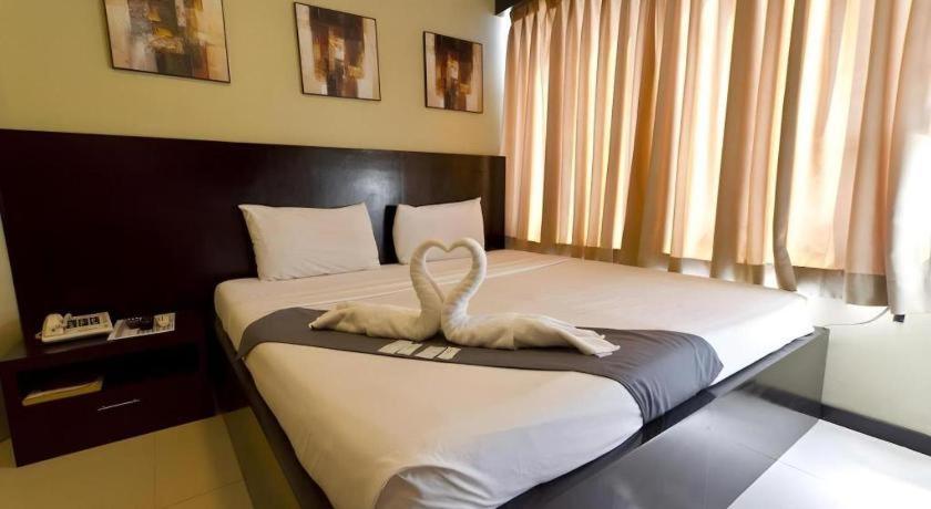 Richmond Plaza Hotel Tabok Екстериор снимка