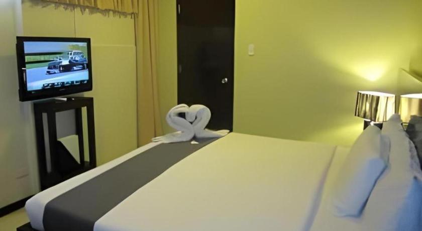 Richmond Plaza Hotel Tabok Екстериор снимка