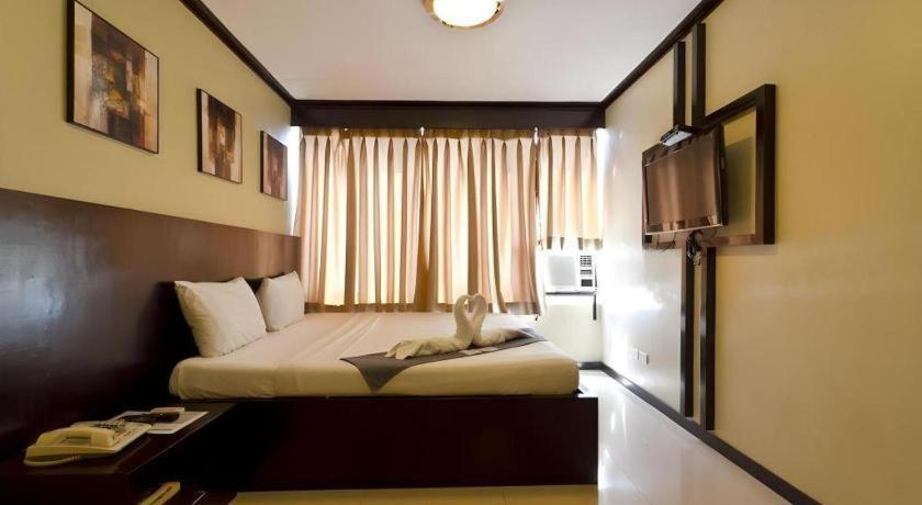 Richmond Plaza Hotel Tabok Екстериор снимка
