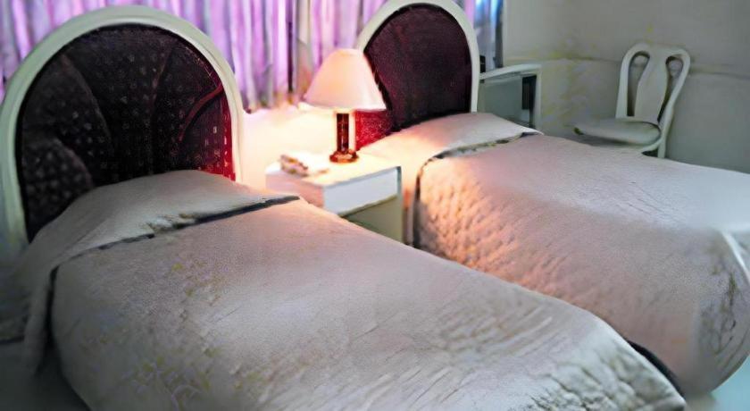 Richmond Plaza Hotel Tabok Екстериор снимка