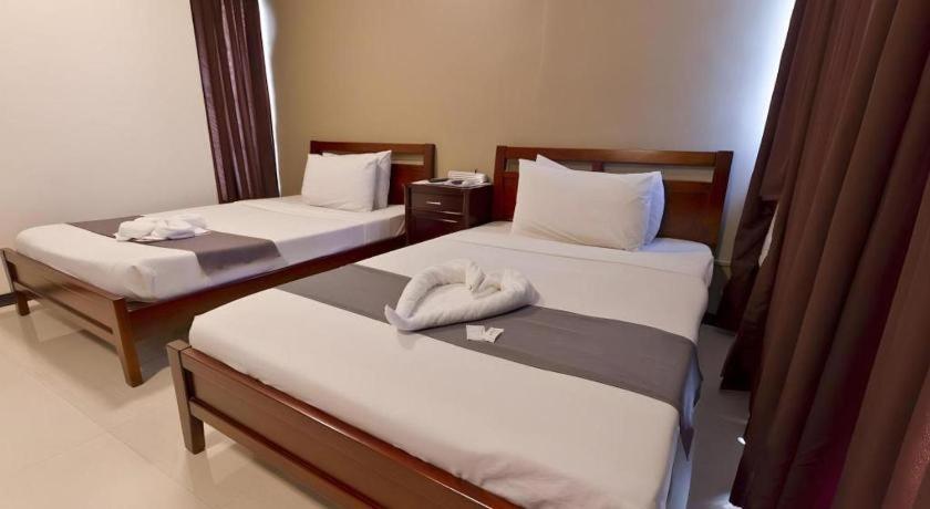 Richmond Plaza Hotel Tabok Екстериор снимка